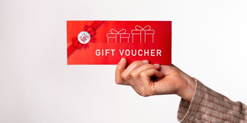 beautiful-gift-voucher-with-hand (1)