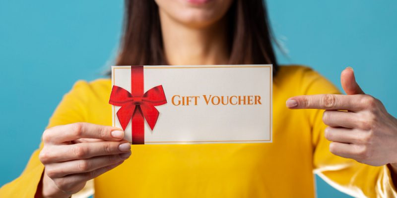 beautiful-gift-voucher-with-hand